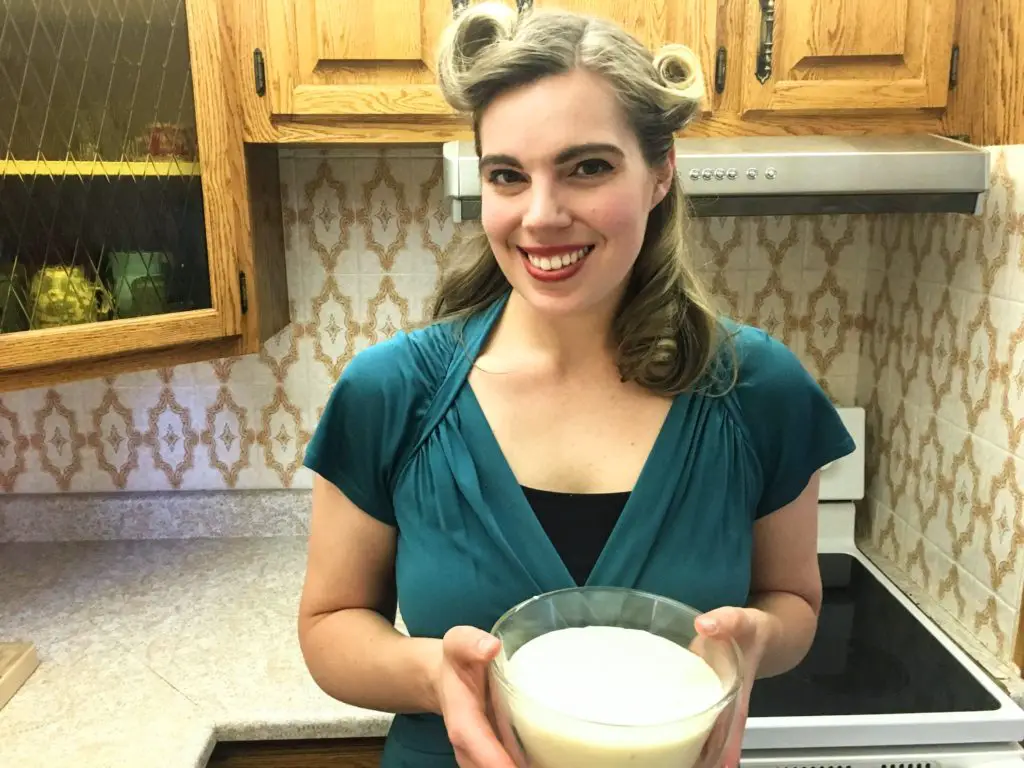 holding a bowl of creamy celery root purée