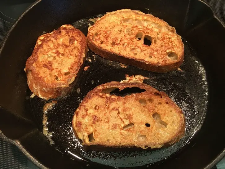 golden brown french toast in a skillet