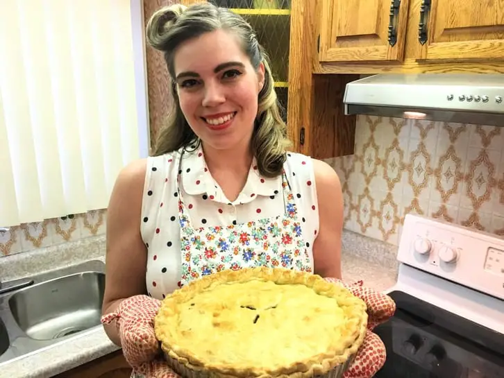 holding a French Canadian tourtière