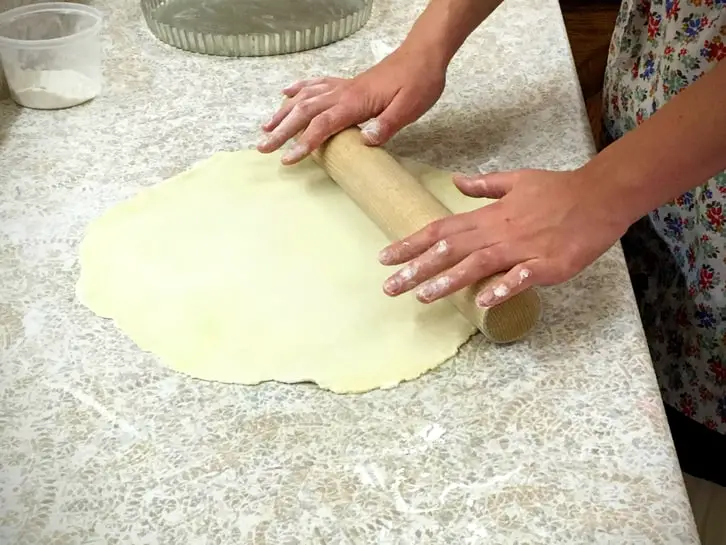 rolling out pate brisée