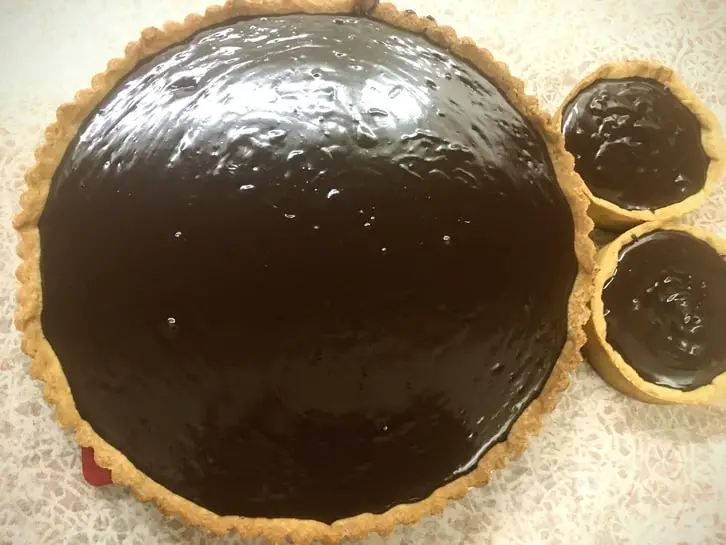 undecorated dark chocolate ganache tart