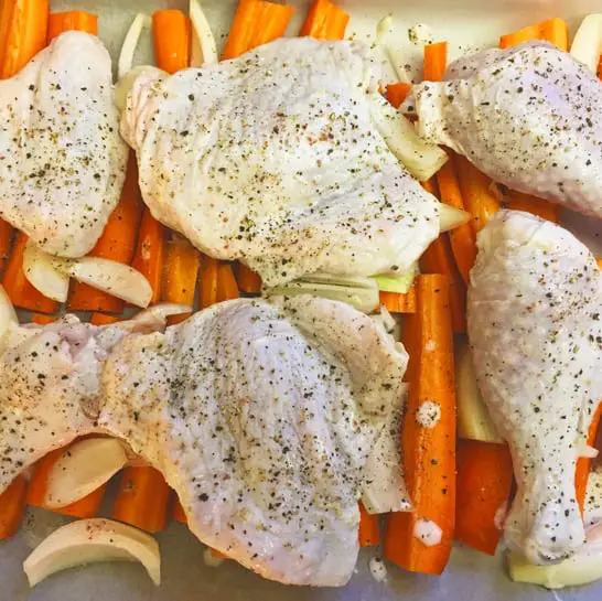 kefir brined chicken on carrots and onions