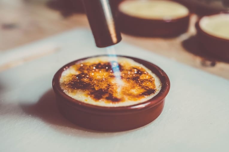 torching a creme brulee