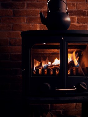 cozy old fashioned wood stove fire