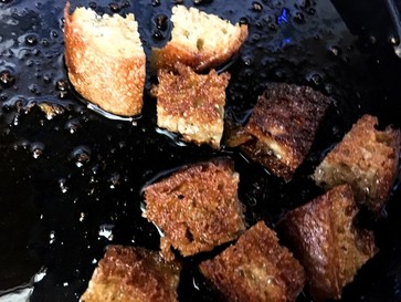 making homemade croutons